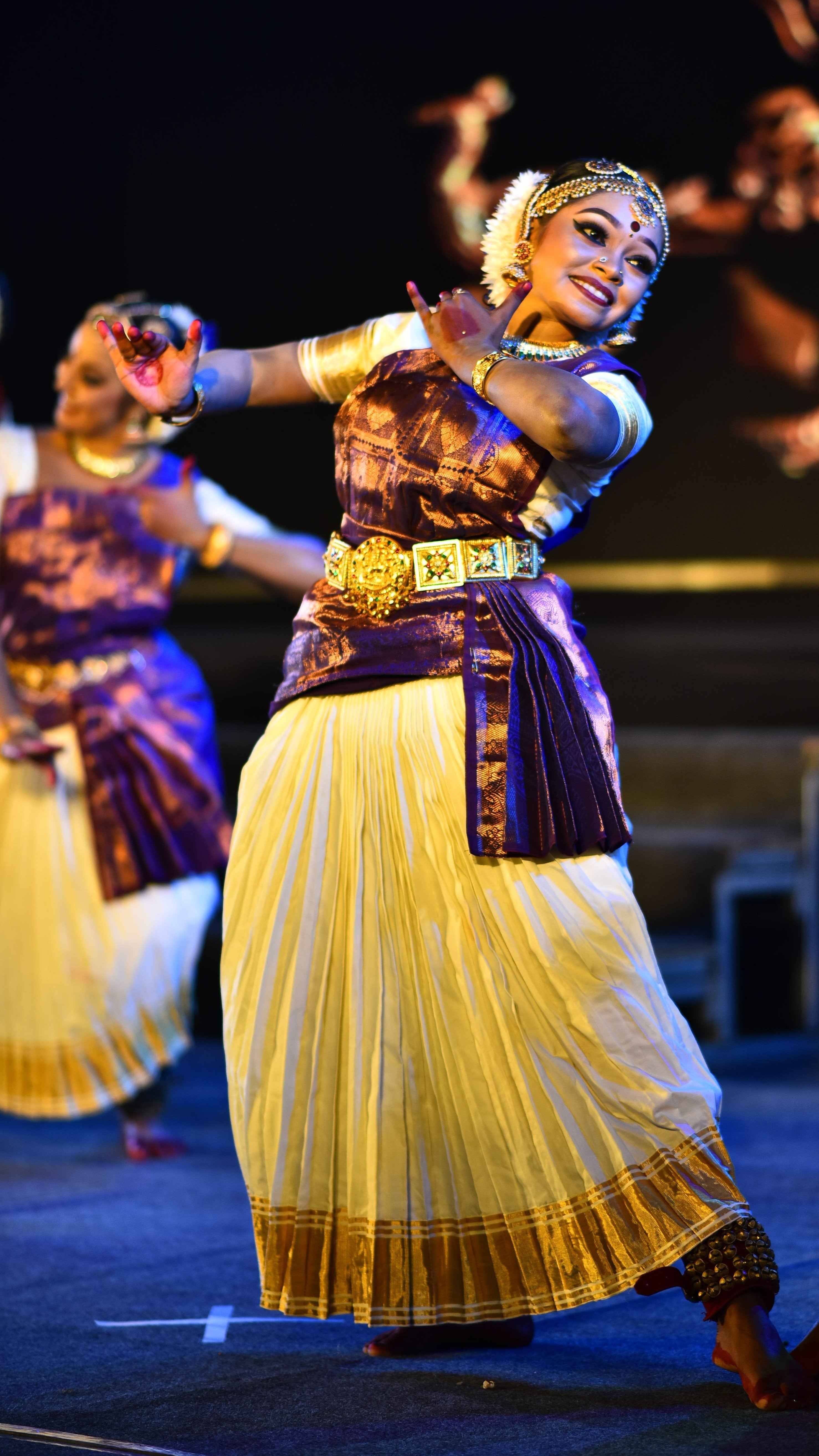 Lakshmi Kumaran performing classical Indian dance in traditional costume